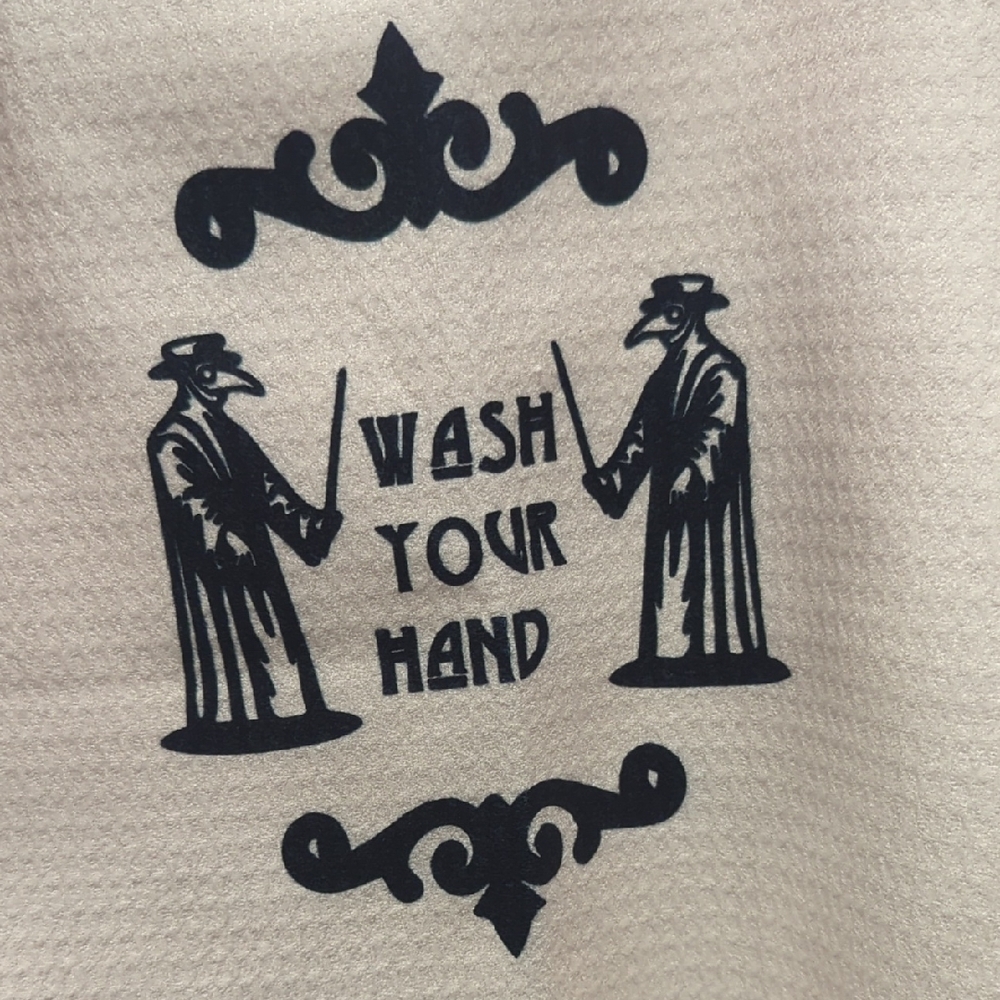 Beige Towel with Black Plague Doctor Design